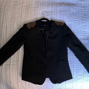 Sassy black jacket with gold shoulder sequence